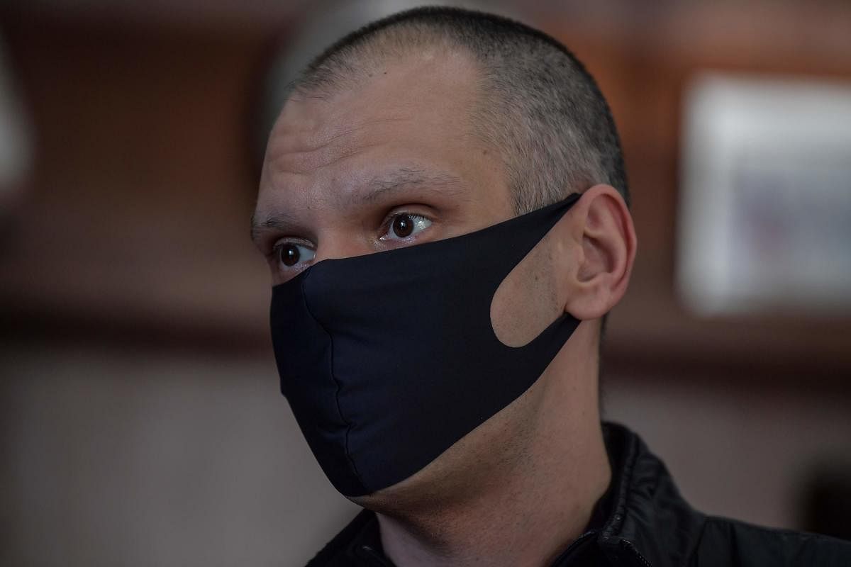 Sao Paulo's Mayor Bruno Covas wears a face mask as a protection agaoinst teh new coronavirus speaks during an interview with AFP at the City Hall of Sao Paulo, Brazil, on May 21, 2020. Credit: AFP Photo