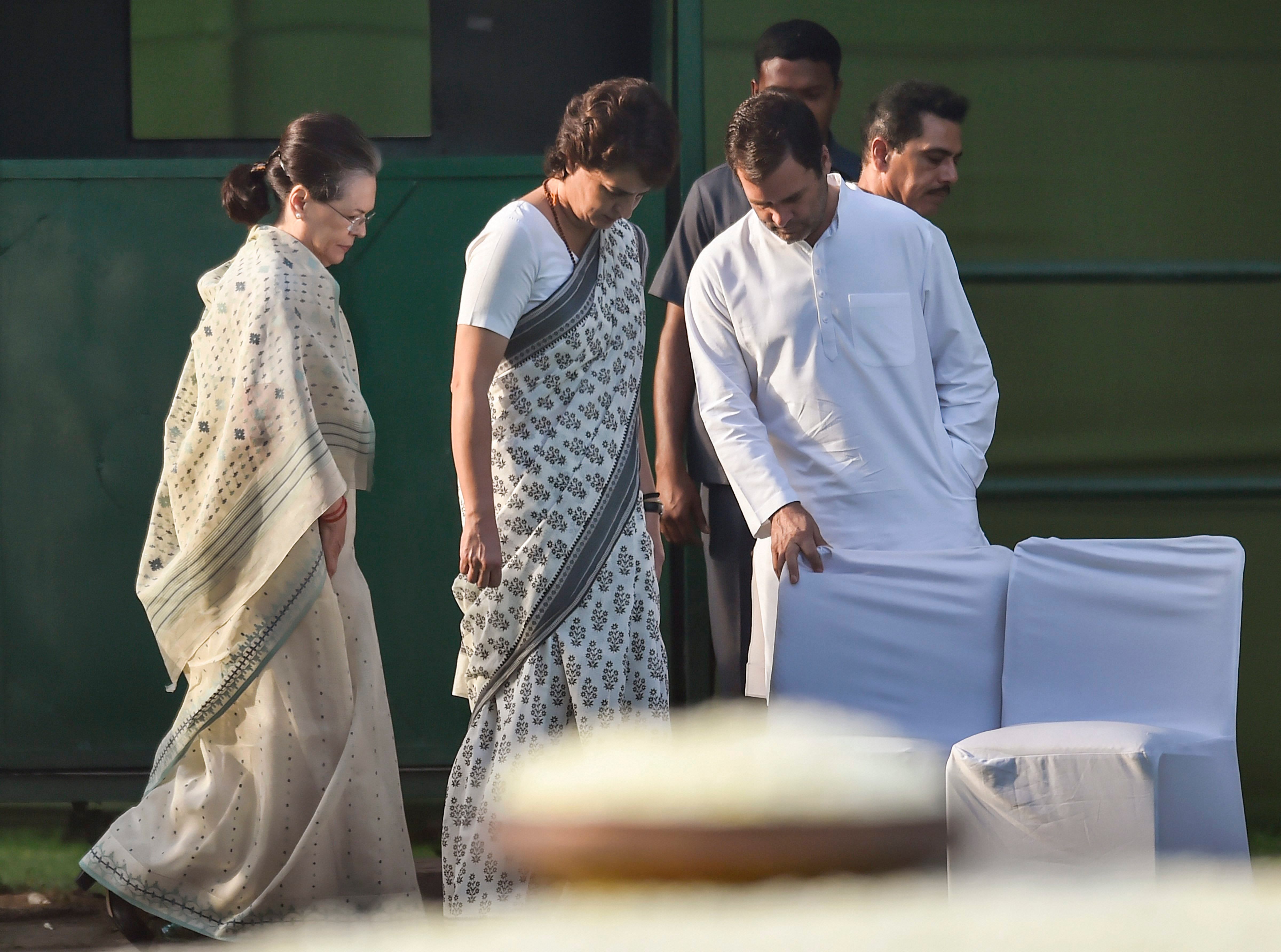 Sonia Gandhi, Rahul Gandhi and General Secretary Priyanka Gandhi Vadra. (PTI Photo)