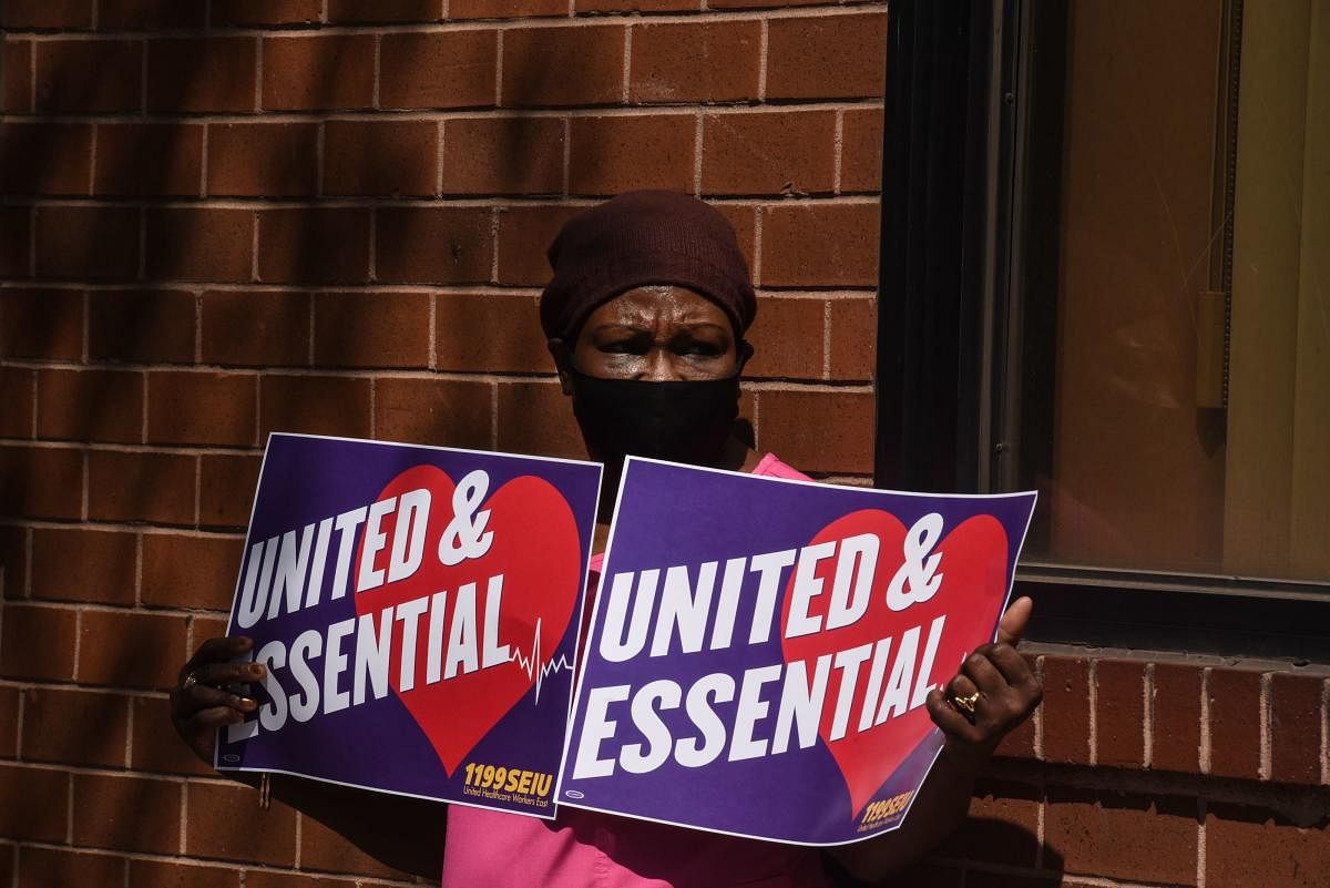Nursing Home Workers Hold Silent Vigils Across New York State During Pandemic. AFP/Getty