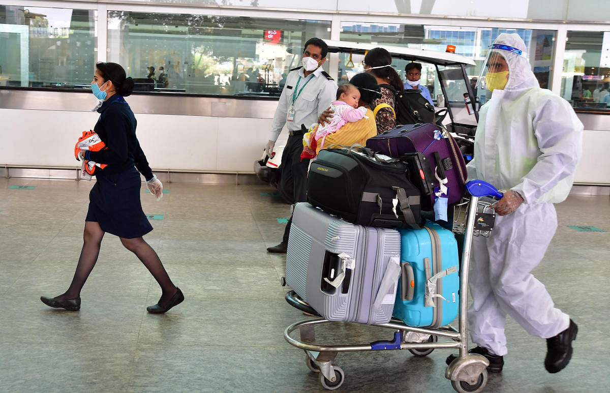 Domestic passengers arrive at the KIA on Monday. DH Photo/Krishnakumar P S