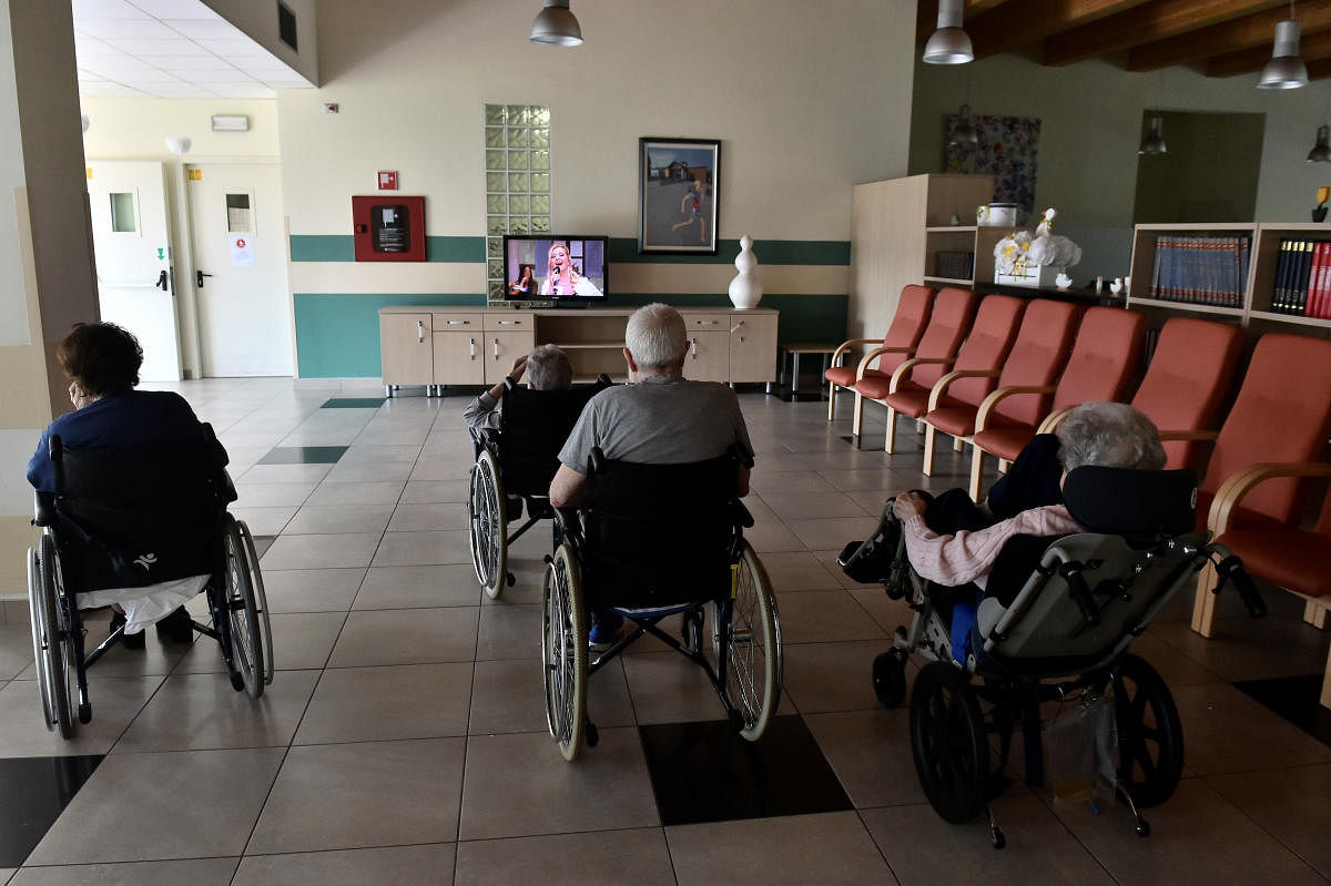 Guests of a nursing home watch television, as the spread of the coronavirus disease (COVID-19) continues in Capralba, near Cremona, Italy. Reuters