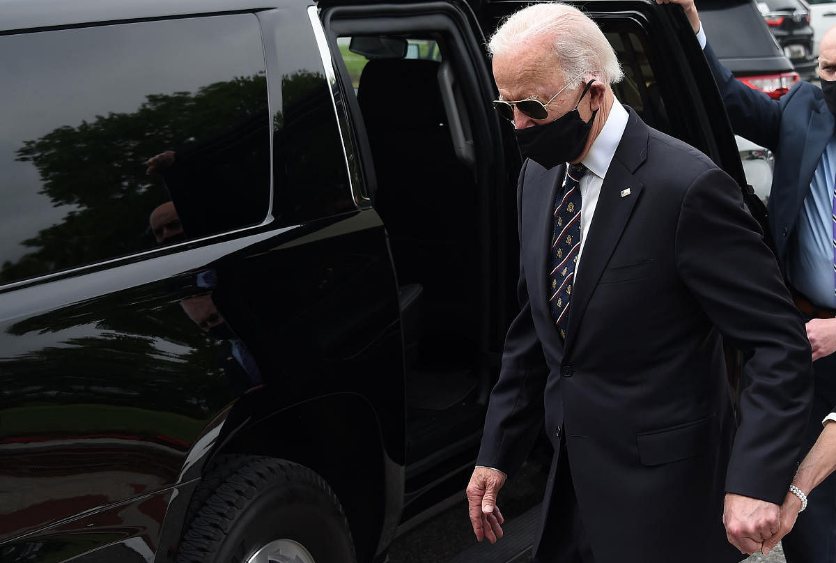 Democratic presidential candidate and former US Vice President Joe Biden (L) departs the Delaware Memorial Bridge Veteran's Memorial Park. AFP