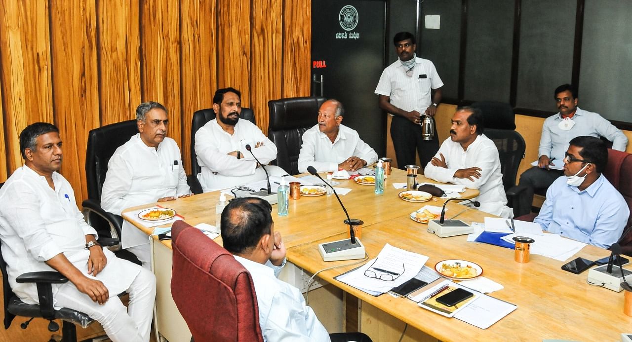 State Transport Minister Laxman Savadi chairing a meeting of North Western Karnataka Road Transport Corporation (NWKRTC) officials and elected representatives in Hubballi on Tuesday. DH photo
