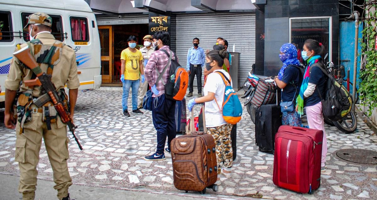 People arriving from various states wait to be quarantined at a hotel, in Guwahati, Tuesday, May 26, 2020. (PTI Photo) 