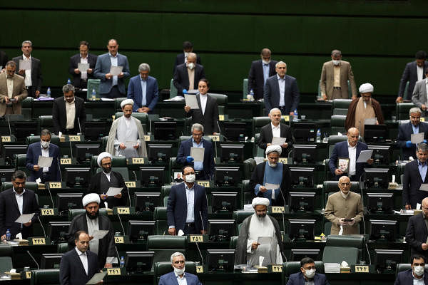 Iranian lawmakers attend the opening ceremony of Iran's 11th parliament, as they practice social distancing measures as the spread of the coronavirus disease (COVID-19) continues, in Tehran, Iran, May 27, 2020. (West Asia News Agency/Reuters Photo)