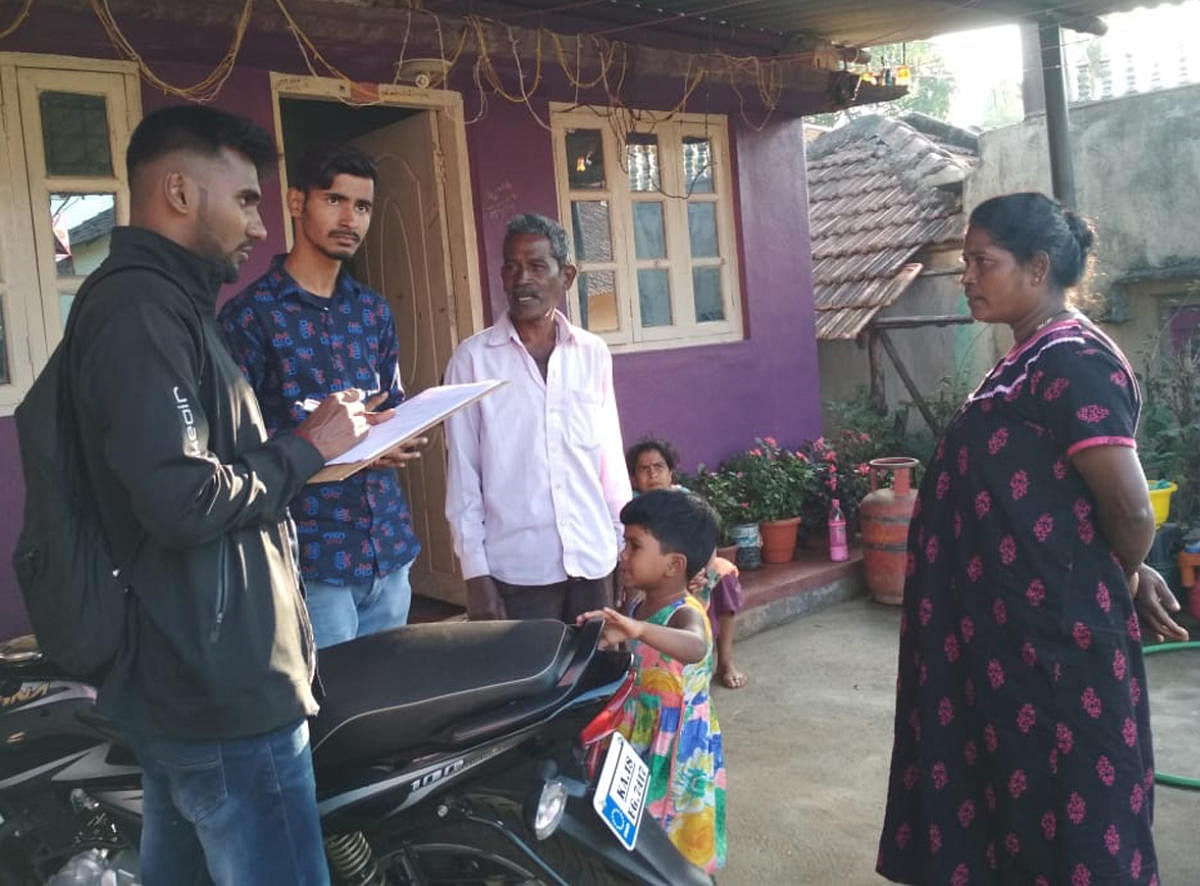 A survey team collecting information from a house in Chikkamagaluru.