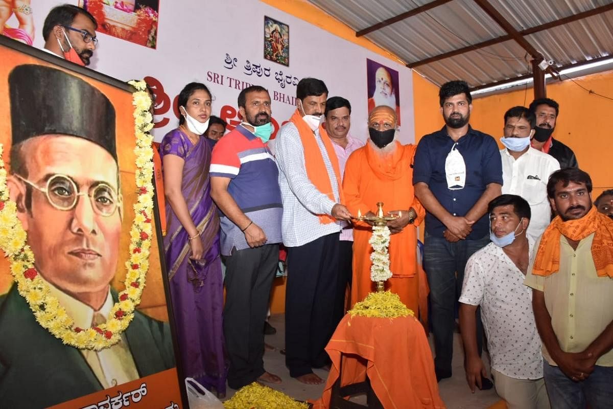 Vinayak Damodar Savarkar Jayanti was observed at Sri Tripura Bhairavi mutt in Mysuru on Thu. MLA L Nagendra, Minister Ramesh Jarkiholi and MP Pratap Simha are seen.