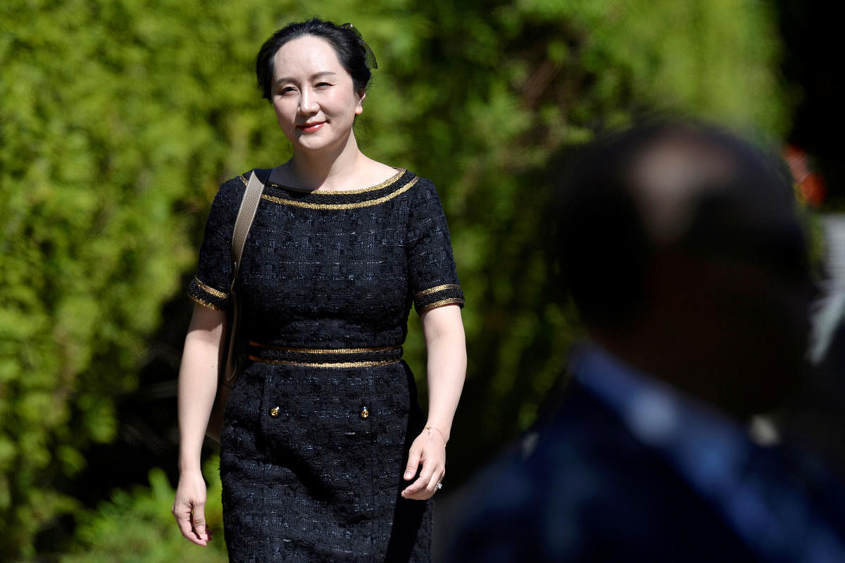 Huawei Technologies Chief Financial Officer Meng Wanzhou leaves her home to attend a court hearing in Vancouver. Reuters