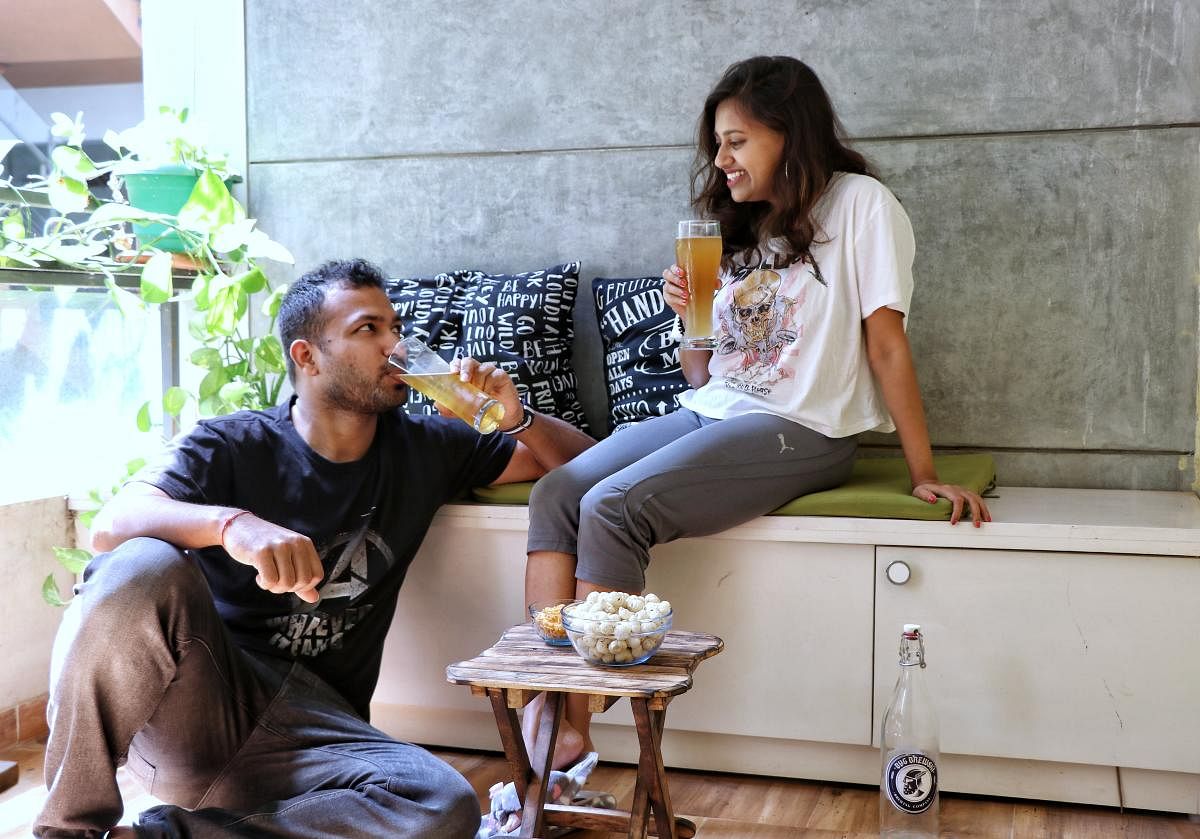 Beer lovers Tapash Kumar and Debolina Ray enjoy their takeaway brew at home.