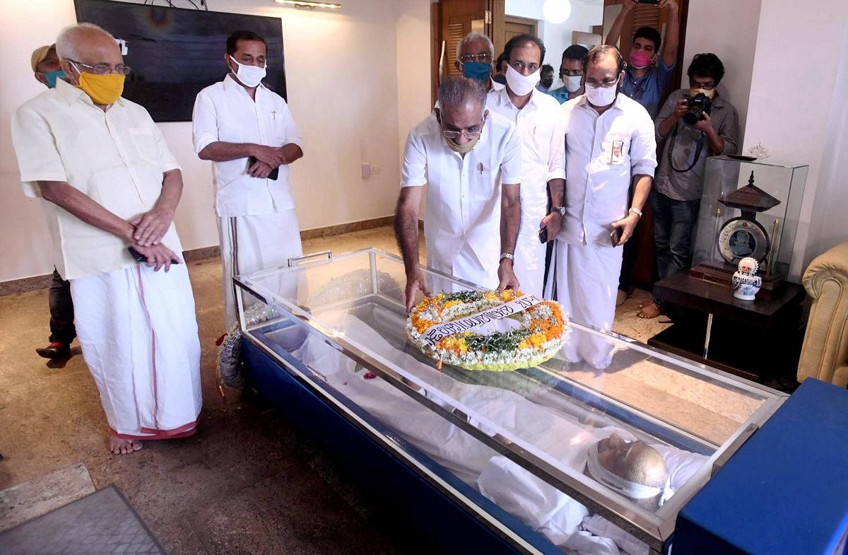  Kerala Transport Minister NK Sasheendran pays last respects to MP Veerendra Kumar in Kozhikode, Friday, May 29, 2020. Veerendra Kumar, a former Union minister and member of PTI's Board of Directors, died on Thursday following a cardiac arrest. (PTI Photo)