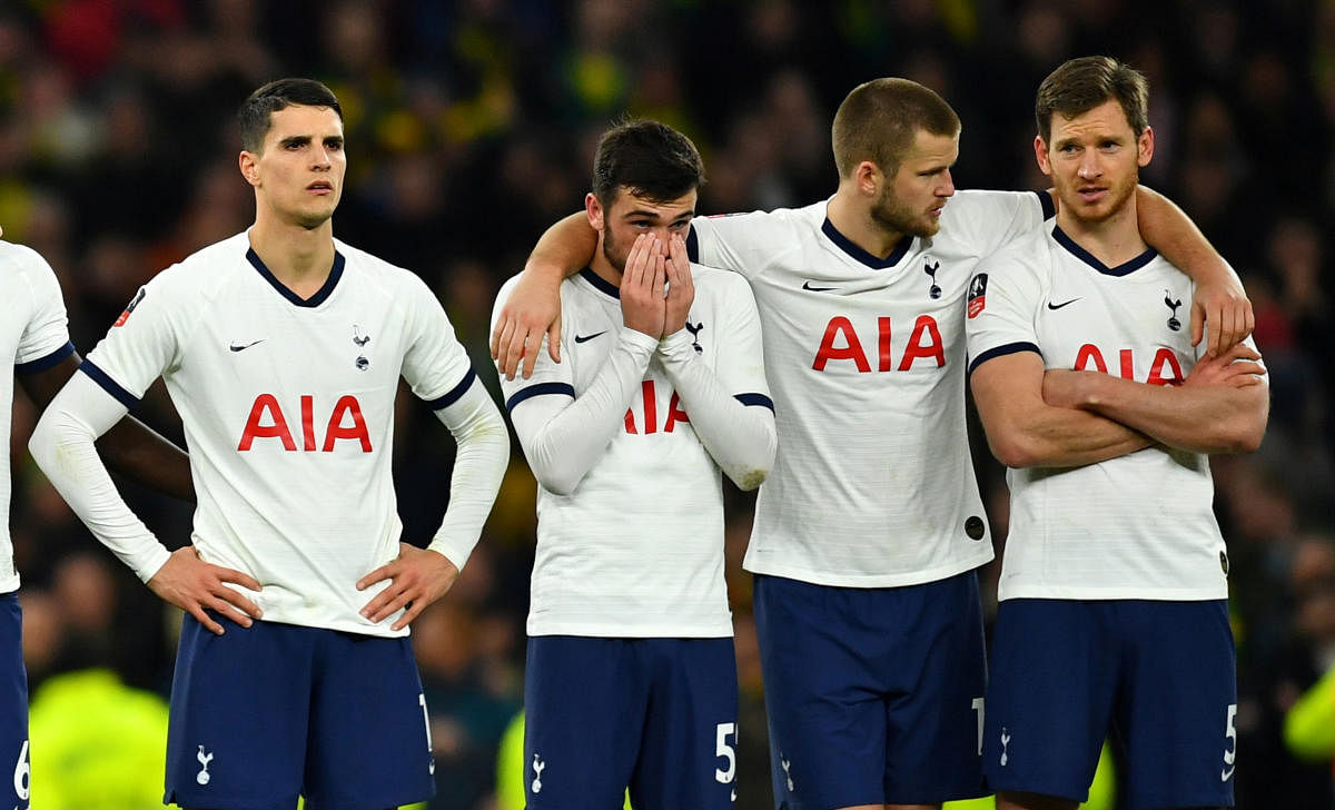 Tottenham Hotspur's Troy Parrott and teammates react during the penalty shootout. Reuters/file