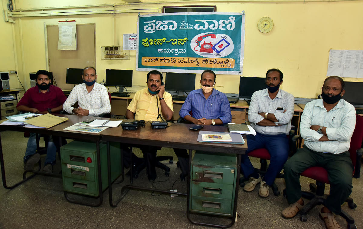 KSRTC Mangaluru division Divisional Controller Arun S N answers to a call during phone -in programme organised by Prajavani at PV-DH office in Mangaluru on Friday. DH Photo
