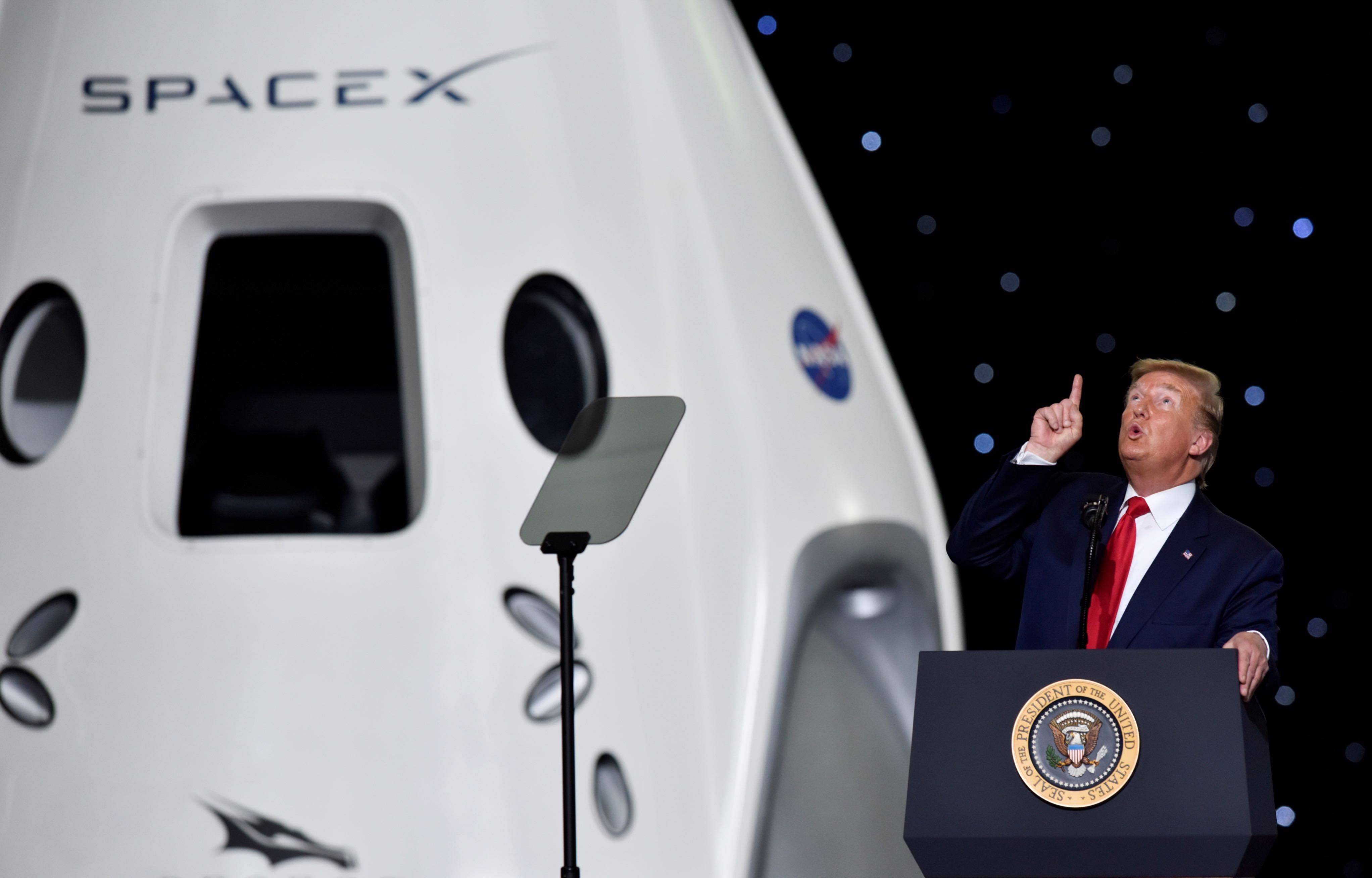 U.S. President Donald Trump gestures as he speaks at a briefing after the launch of a SpaceX Falcon 9 rocket and Crew Dragon spacecraft on NASA's SpaceX Demo-2 mission to the International Space Station from NASA's Kennedy Space Center in Cape Canaveral, Florida. (Reuters photo)