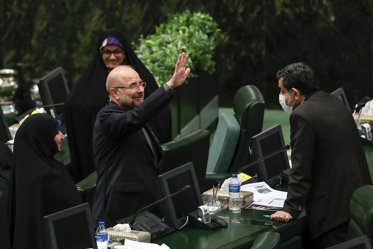 Mohamad Bagher Ghalibaf greets members of the parliament after being elected as parliament speaker at the Iranian parliament in Tehran. AFP