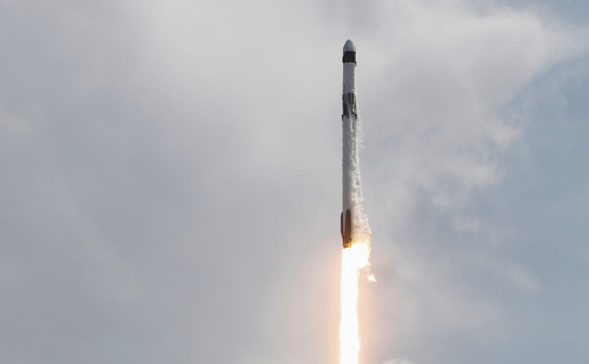 A SpaceX Falcon 9 rocket and Crew Dragon spacecraft carrying NASA astronauts Douglas Hurley and Robert Behnken lifts off. Reuters