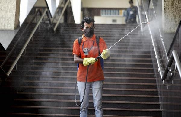 A municipal worker disinfects a metro station during ongoing COVID-19 lockdown, Ahmedabad, Friday, May 29, 2020. (PTI Photo) 