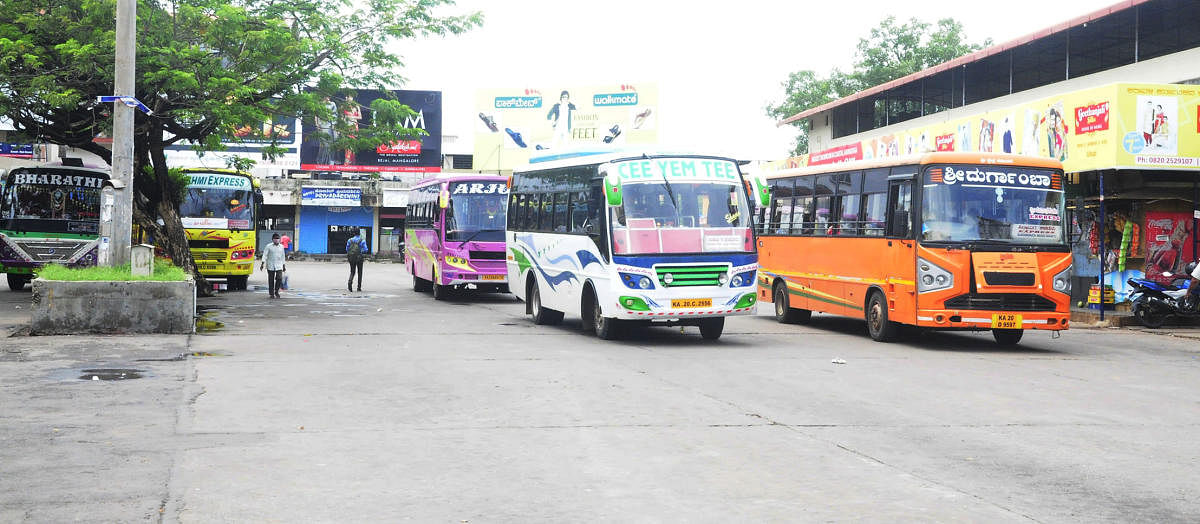 Private buses venture on to the road after a gap of nearly two months in Udupi. DH Photo