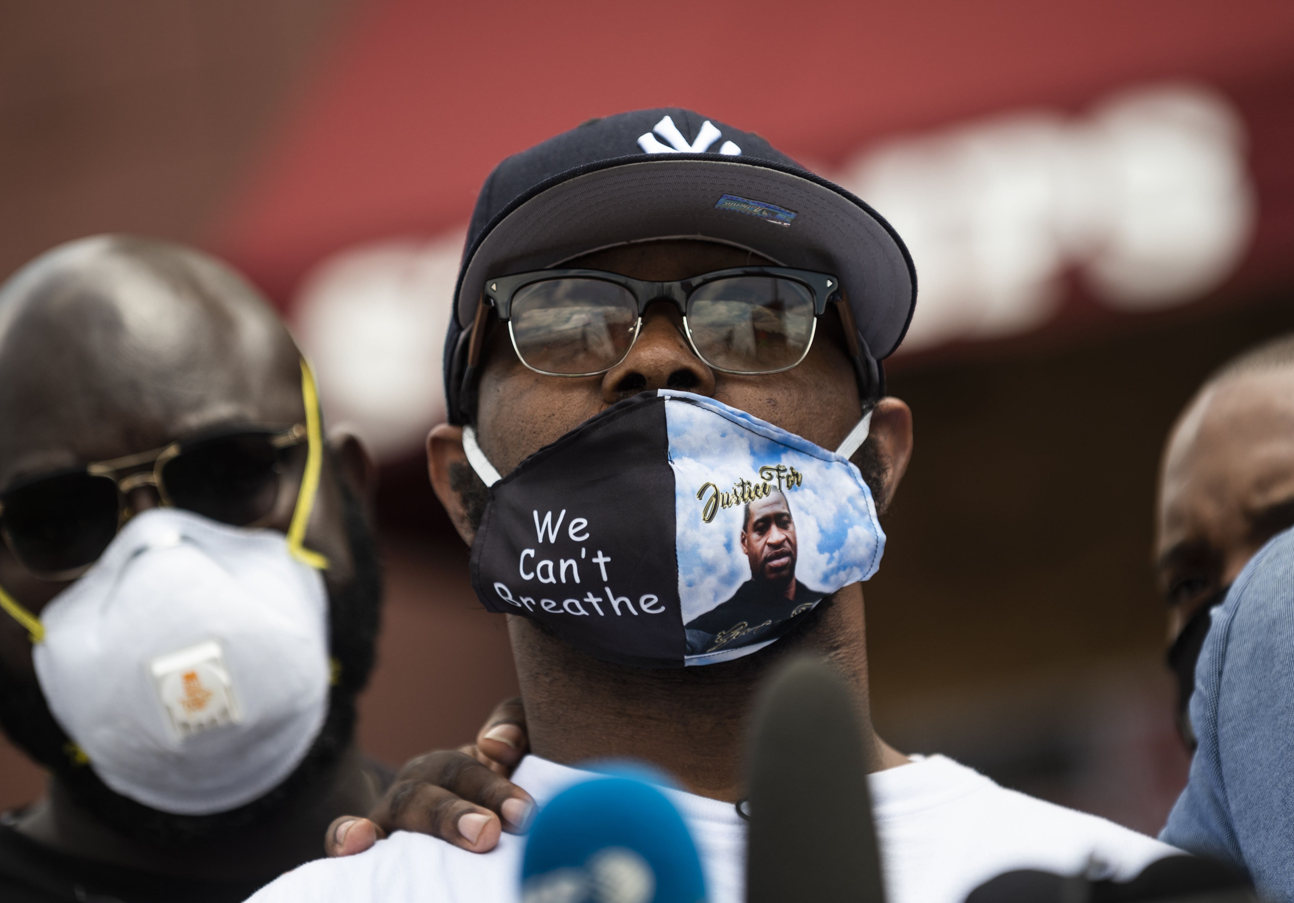 Terrence Floyd (C) arrives at the site where his brother George Floyd was killed by police one week ago on June 1, 2020 in Minneapolis, Minnesota. (Credit: AFP Photo)