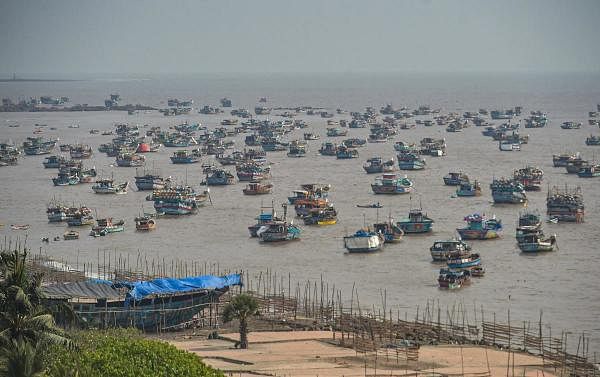 Fishing boats seen anchored at a shore following a warning by Indian Meteorological Department (IMD) for fishermen not to enter the Arabian Sea for the next two days as a precaution against cyclone 'Nisarga', at Uttan beach in Thane, Monday, June 1, 2020. (PTI Photo/Mitesh Bhuvad)