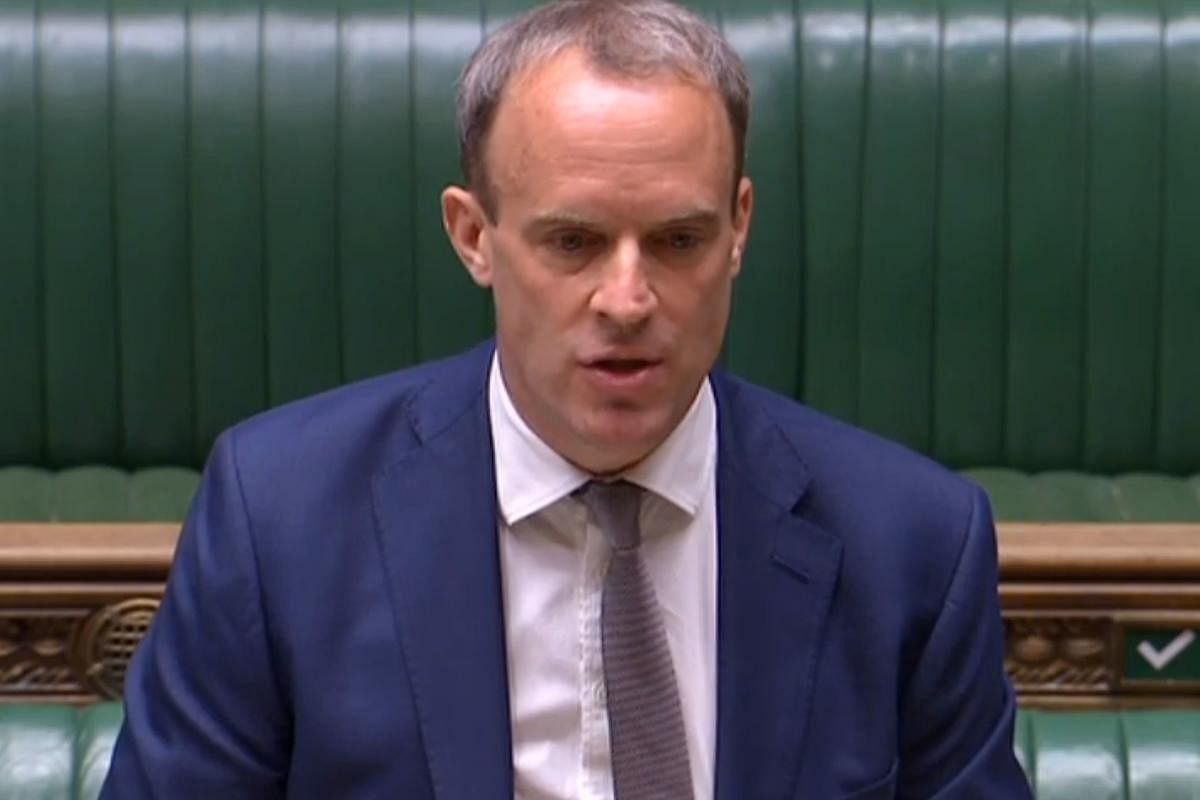 A video grab from footage broadcast by the UK Parliament's Parliamentary Recording Unit (PRU) shows Britain's Foreign Secretary Dominic Raab making a statement on the government's response to China's proposed new security legislation in Hong Kong in the House of Commons in London. AFP PHOTO / PRU