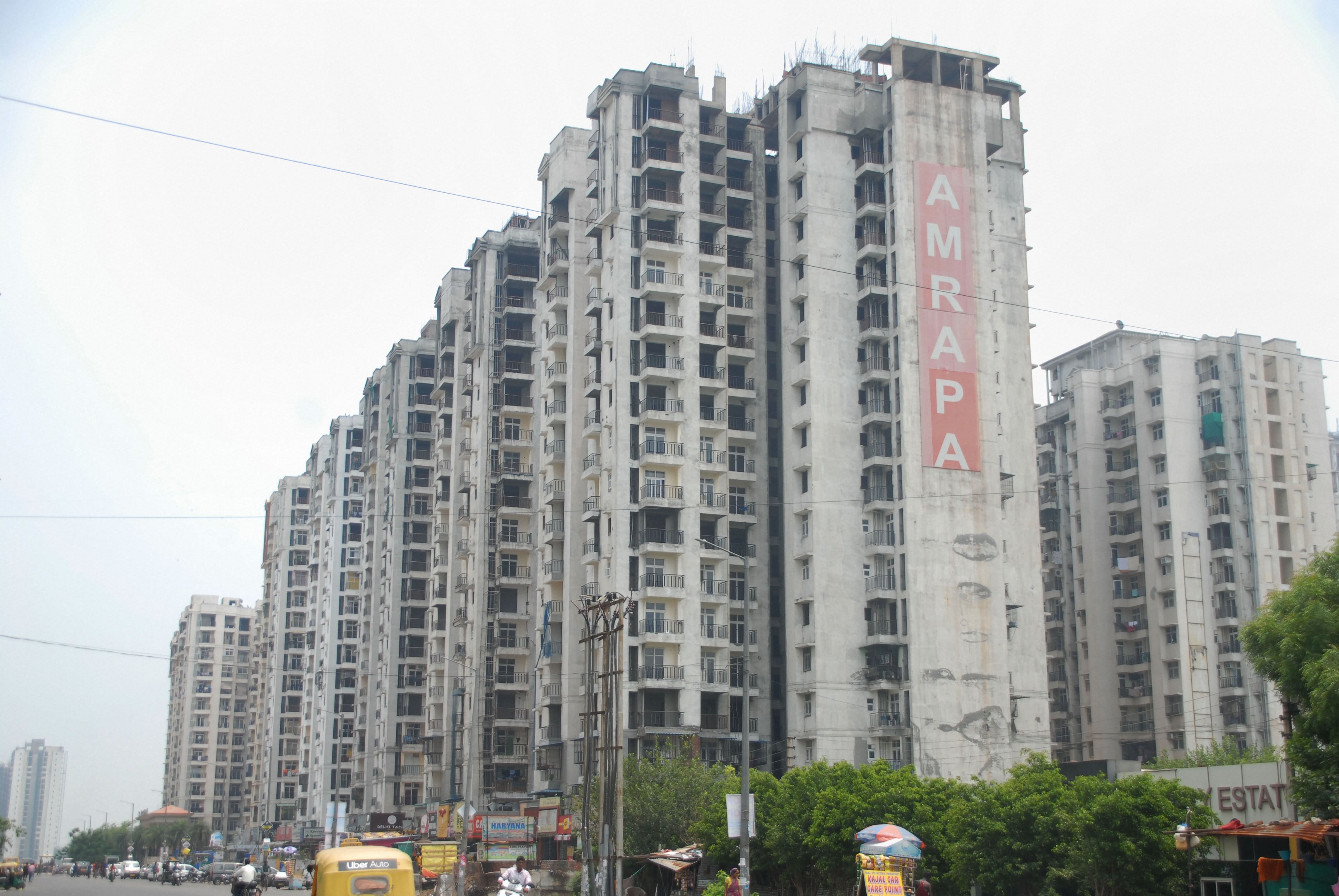  A view of the Amrapali buildings at sector 78, in Noida, Tuesday, July 23, 2019. The Supreme Court today cancelled the registration of the embattled Amrapali group under the Real Estate Regulatory Authority and the lease of its properties granted by Noida and Greater Noida authorities. (PTI Photo)