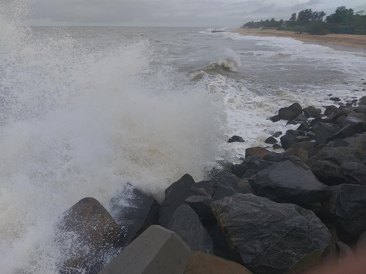 The waves lashing the boulders at Ullal on Wednesday. DH photo