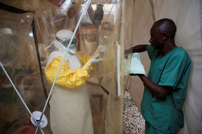 A health worker wearing Ebola protection gear enters the Biosecure Emergency Care Unit at the ALIMA Ebola treatment centre in Beni. (Reuters Photo)
