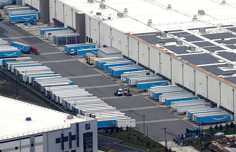 Amazon.com trucks are seen at an Amazon warehouse in Staten Island in New York City. (Reuters Photo)