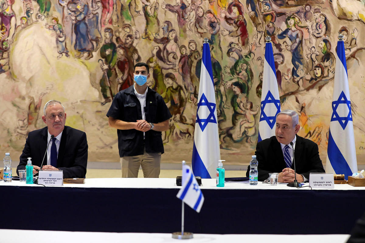 Israeli Prime Minister Benjamin Netanyahu and Defense Minister Benny Gantz attend a cabinet meeting of the new government at the Chagall Hall in the Knesset, the Israeli Parliament in Jerusalem May 24, 2020. Credit/Reuters Photo