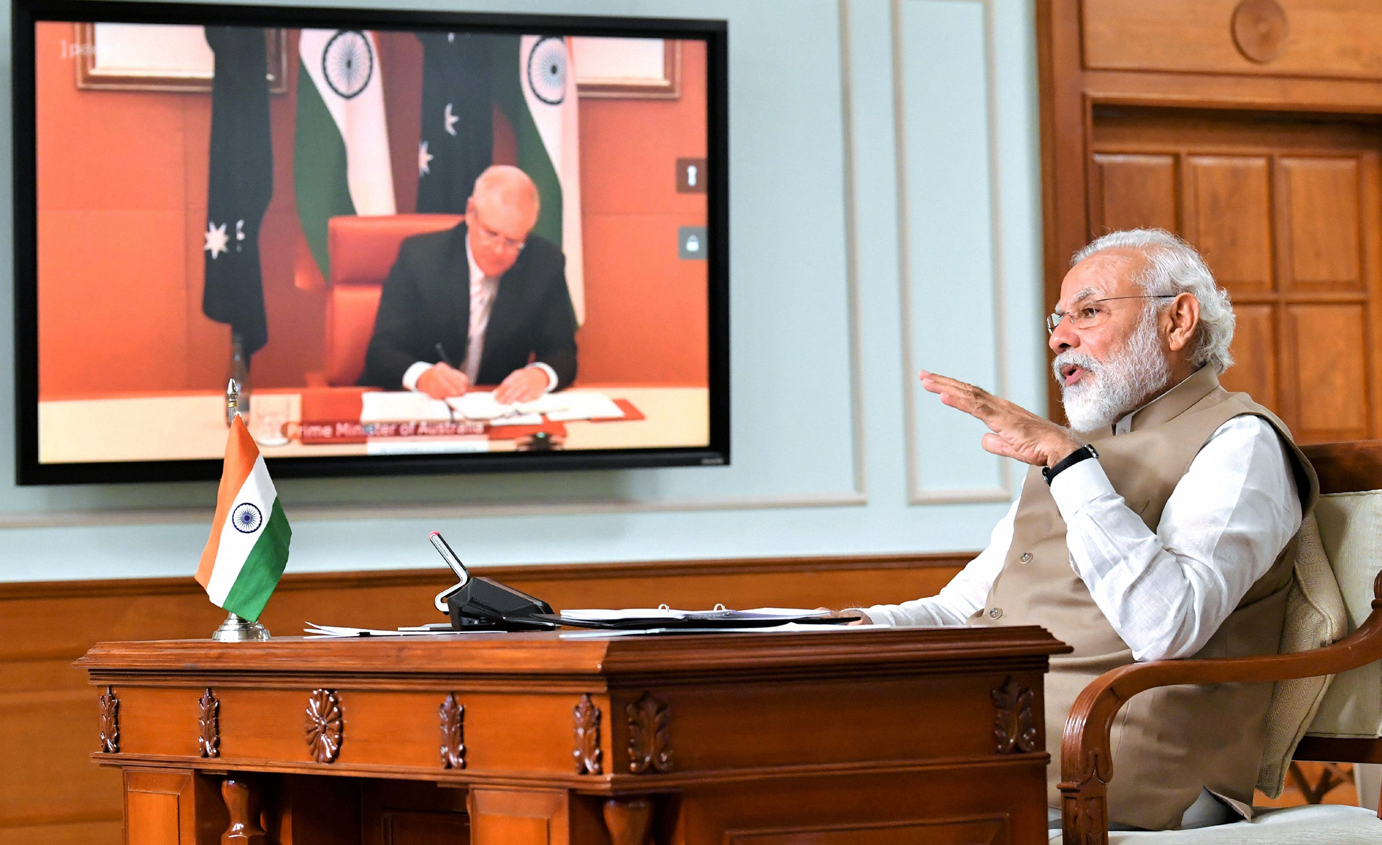 Prime Minister Narendra Modi with Australian Prime Minister Scott Morrison during the India-Australia Leaders’ Virtual Summit, in New Delhi, Thursday, June 4, 2020. (PIB/PTI Photo)