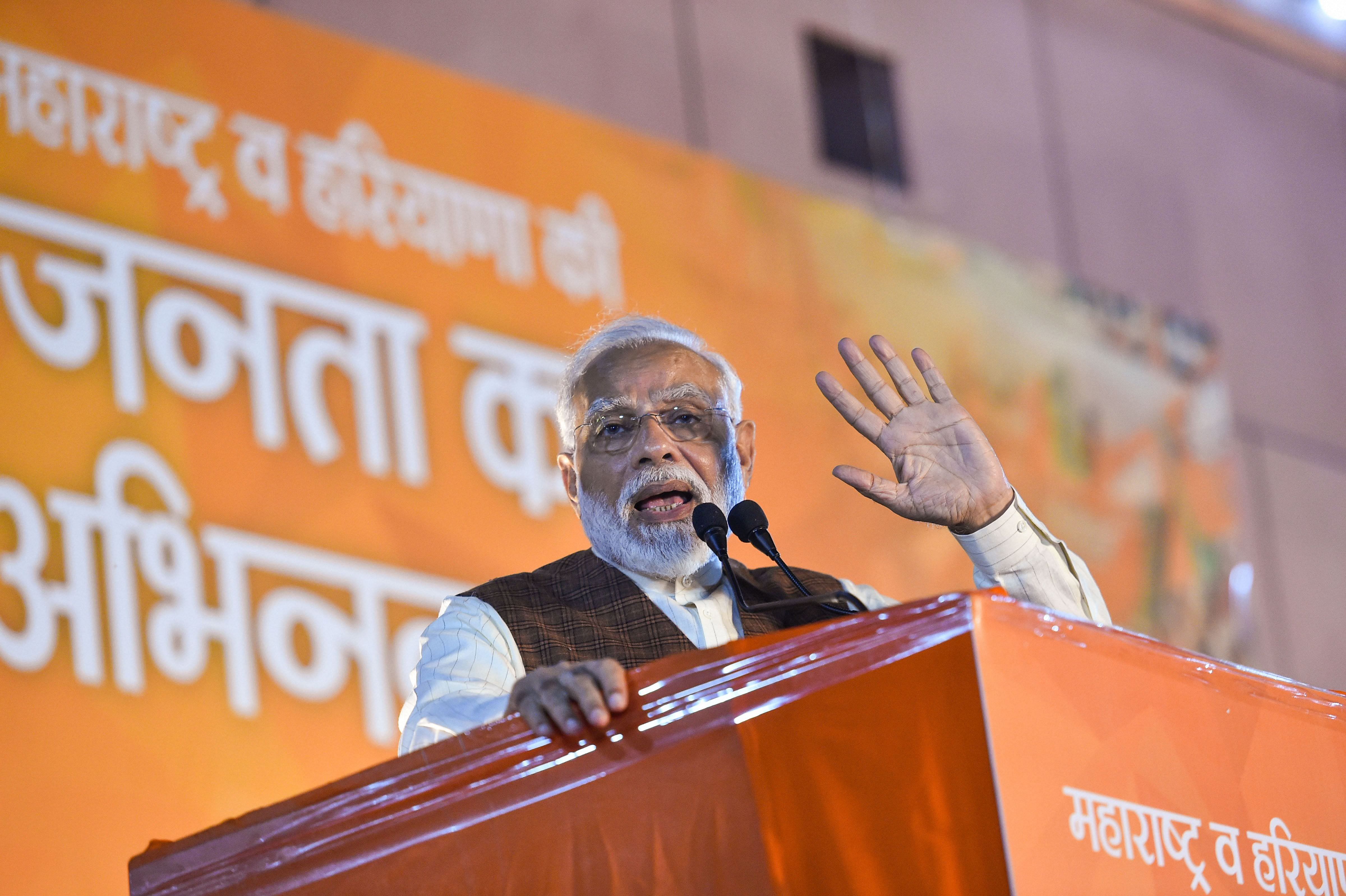 Prime Minister Narendra Modi addresses his supporters after the party's victory in both Haryana and Maharashtra Assembly polls, at BJP HQ, in New Delhi, Thursday, Oct 24, 2019. Credit: PTI Photo