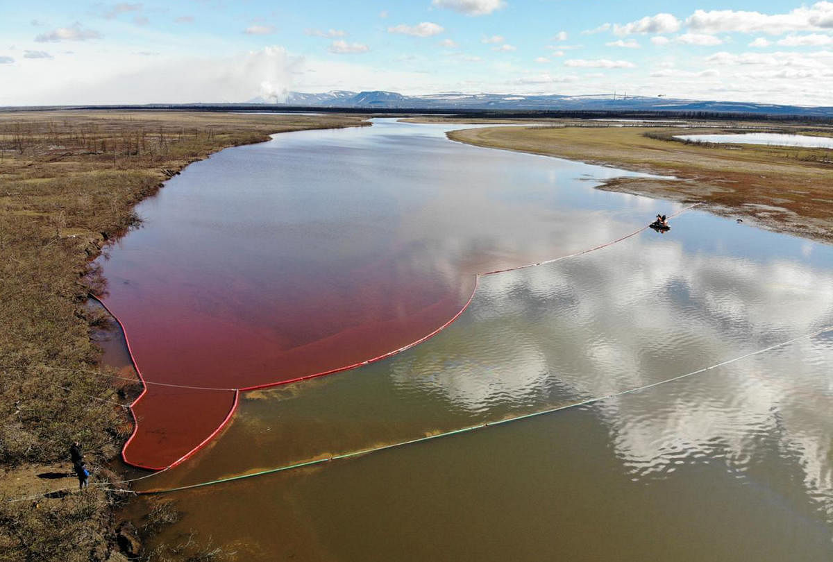 This handout photograph taken and released by the Marine Rescue Service of Russia on June 3, 2020, shows a large diesel spill in the Ambarnaya River outside Norilsk. Credit/AFP