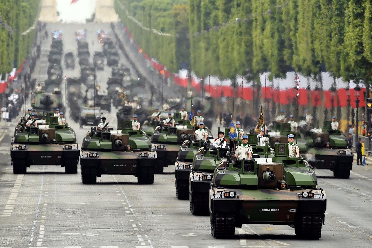 In this file photo taken on July 14, 2019 French soldiers parade in Leclerc tanks during the Bastille Day military parade down the Champs-Elysees avenue in Paris. AFP