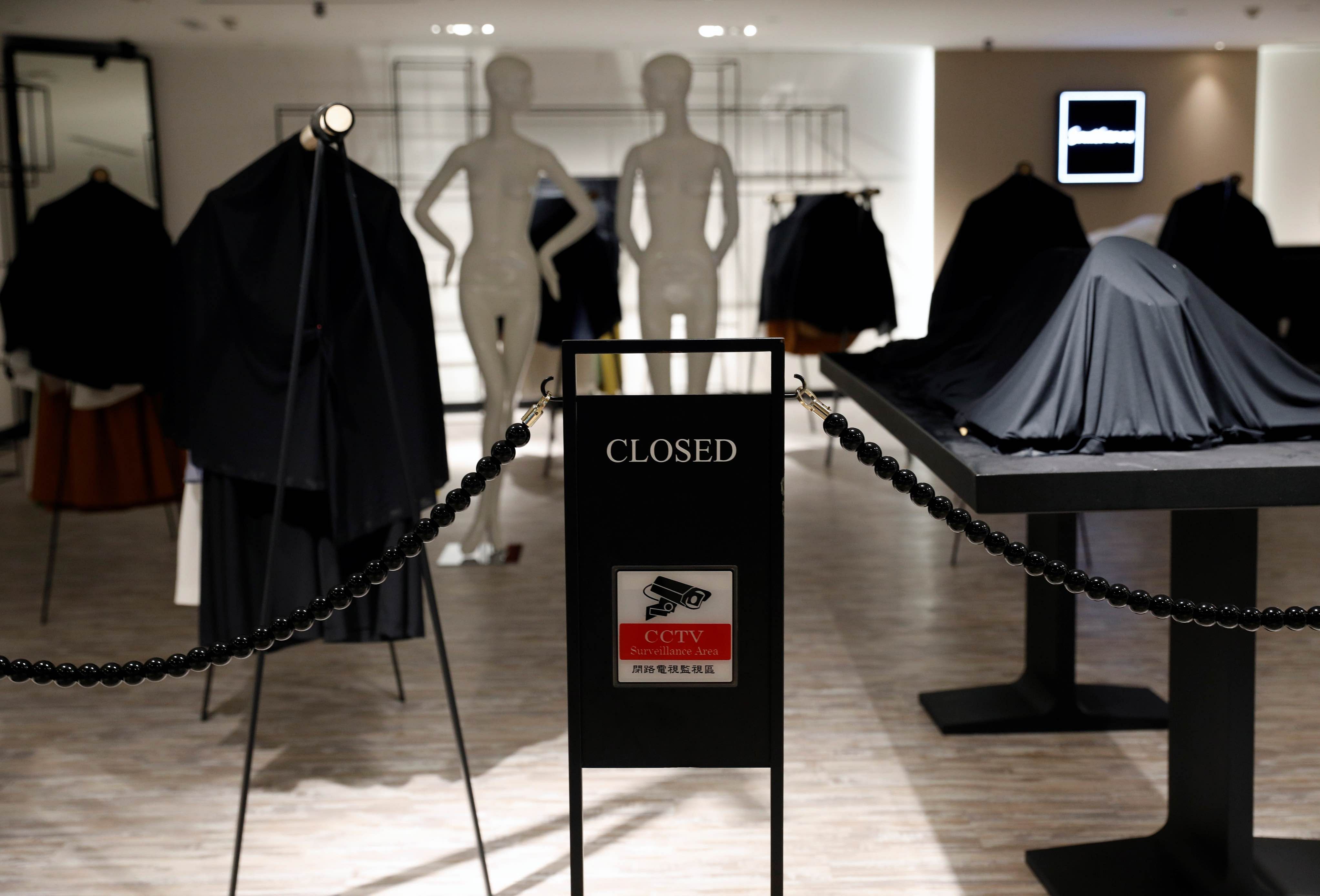 A 'closed' sign is displayed outside a fashion boutique amid the coronavirus disease (COVID-19) outbreak in Singapore. Credit: Reuters Photo