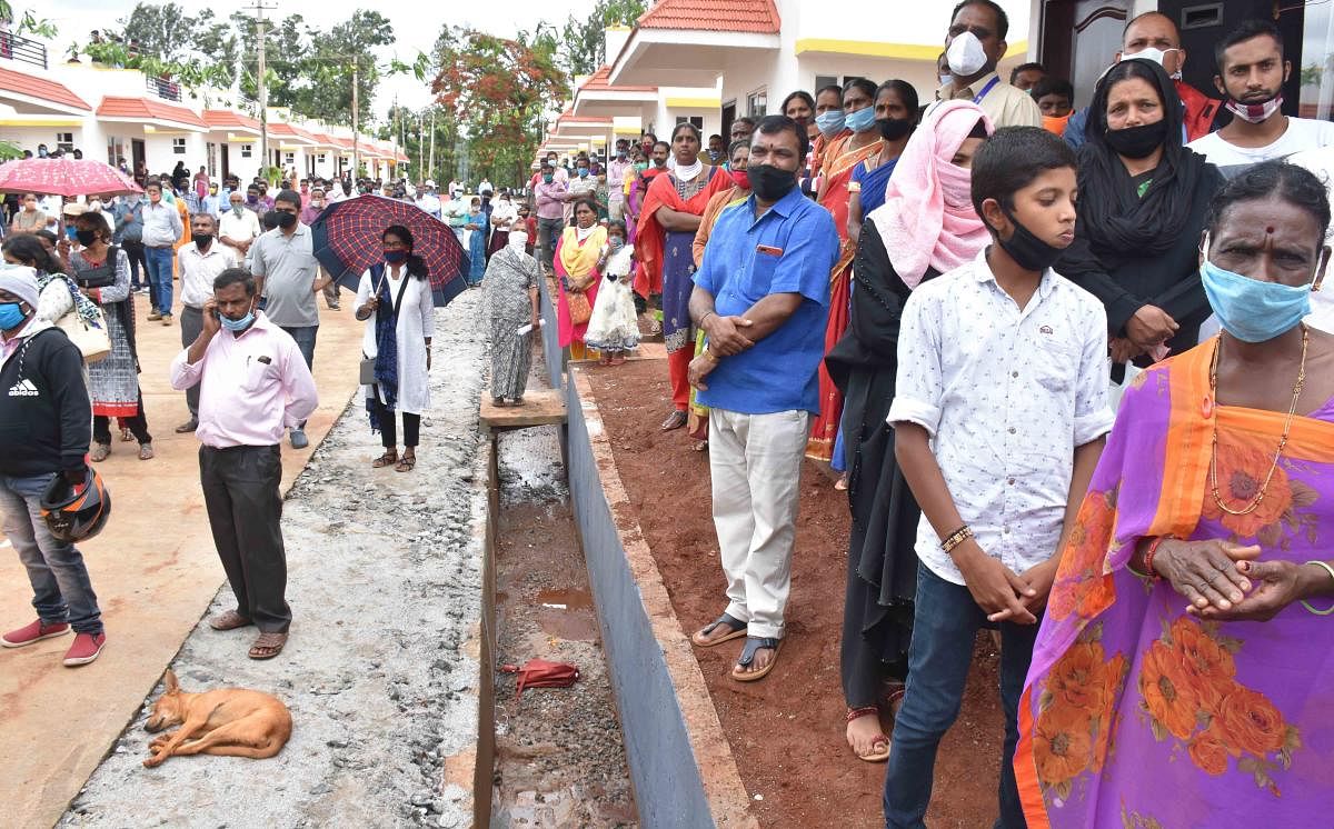 Beneficiaries during the handing over of the houses.