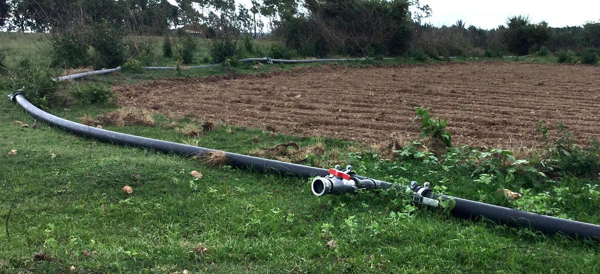 A pipeline laid to supply water to farmland in Hadihalli.