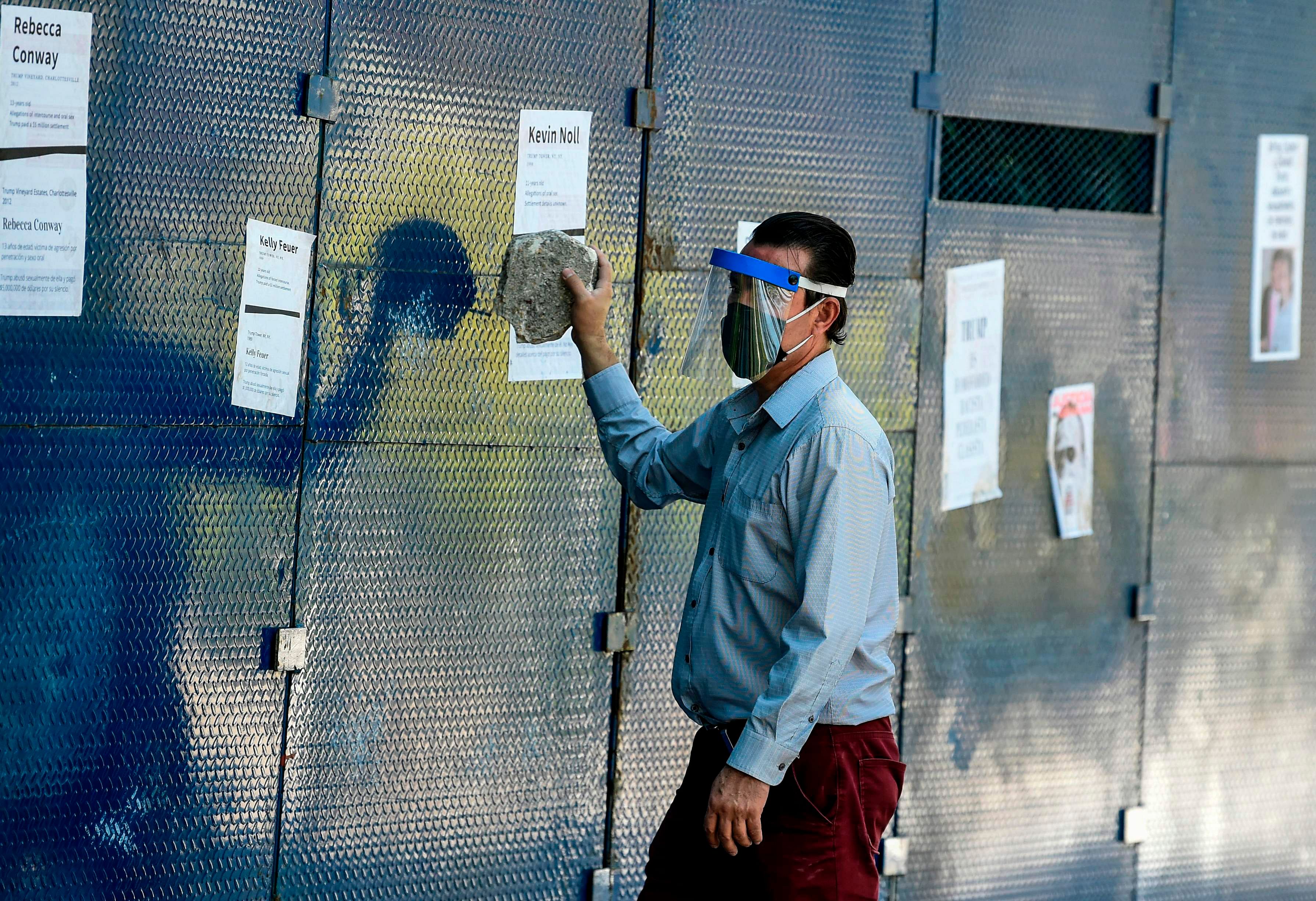 A demonstrators takes part in a protest outside the US Embassy following the death of a young man while in police custody, after he had been arrested allegedly for failing to comply with measures to prevent the spread of COVID-19 coronavirus, in Mexico City. Credits: AFP Photo