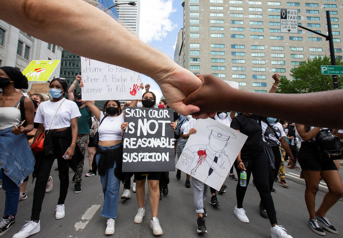 People march during a protest against racial inequality and police brutality (Reuters Photo)