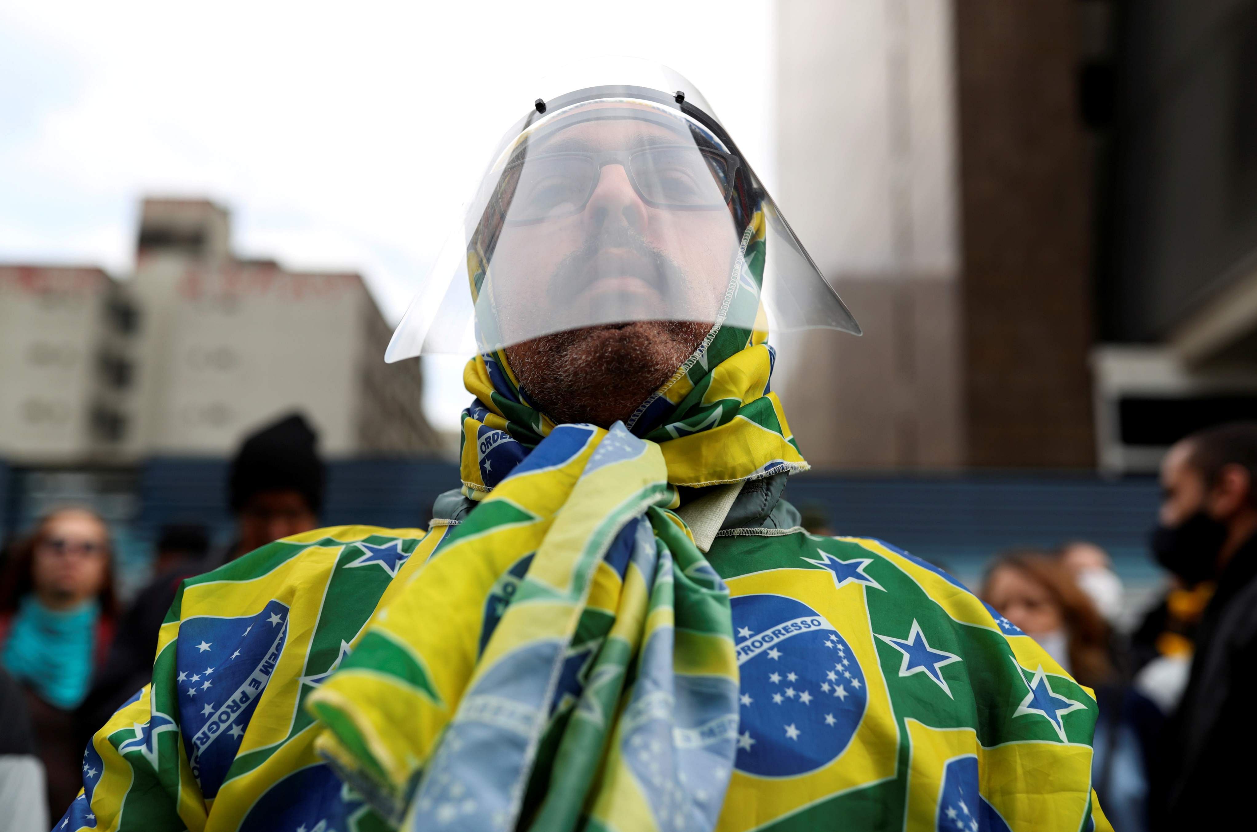 Brazil's far-right president has famously compared the new coronavirus to a "little flu" and railed against stay-at-home measures to contain it, citing their economic toll. Credit: Reuters