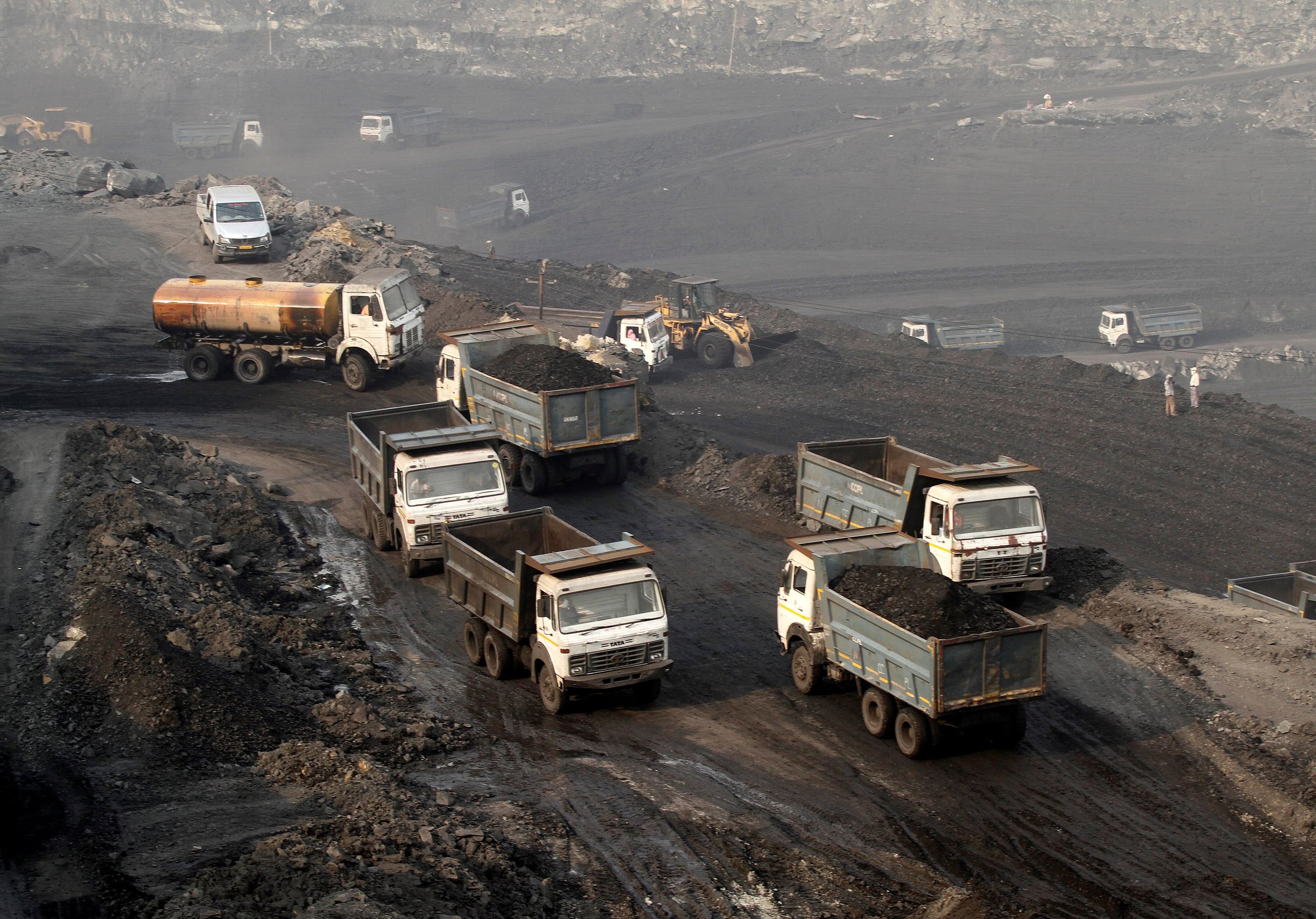 Trucks move in the Mahanadi coal fields, near Talcher town in the eastern state of Odisha, India. Credit: Reuters File Photo