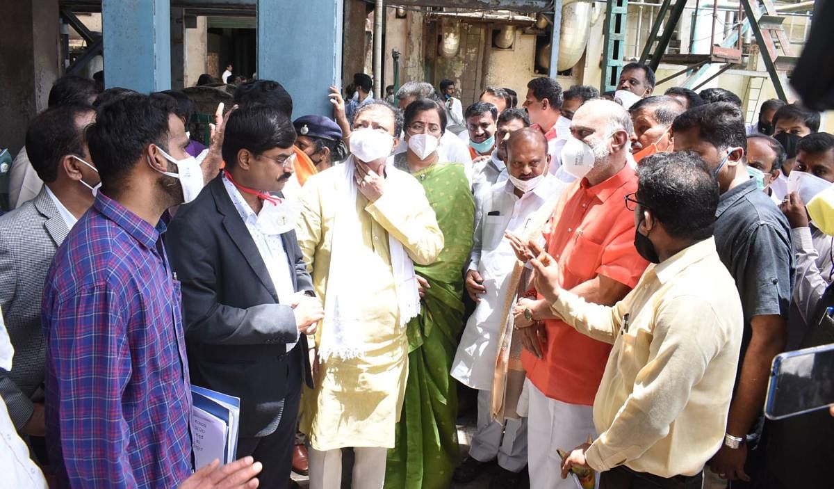 Sugar Minister Shivaram Hebbar inspects the MySugar factory in Mandya on Wednesday.