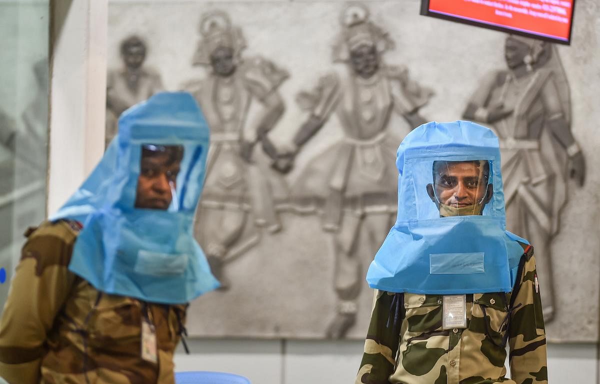 CRPF personnel wearing protective masks (PTI Photo)