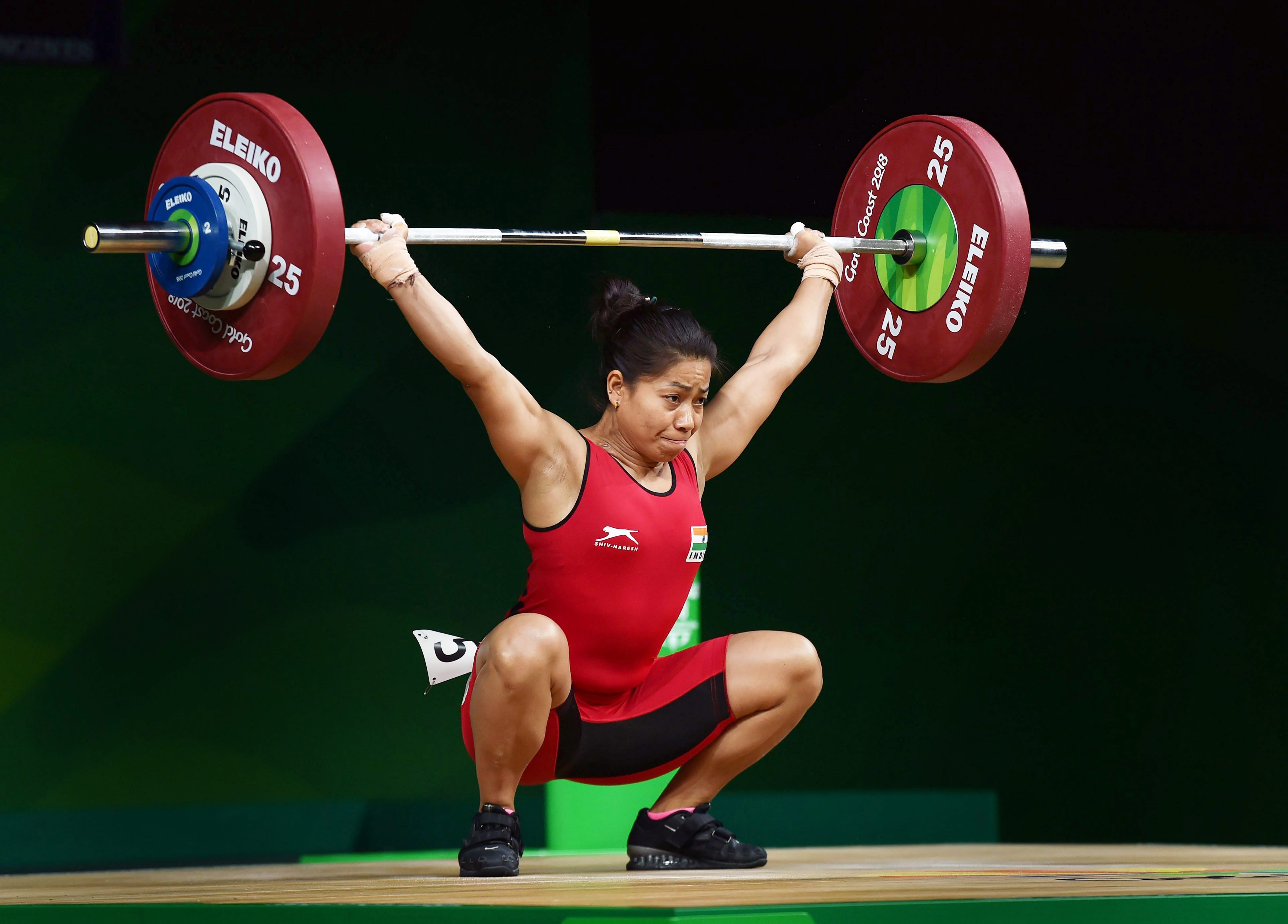 Indian weightlifter Sanjita Chanu competes in the women's 53kg weightlifting event during the Commonwealth Games 2018 in Gold Coast. Credits: PTI Photo