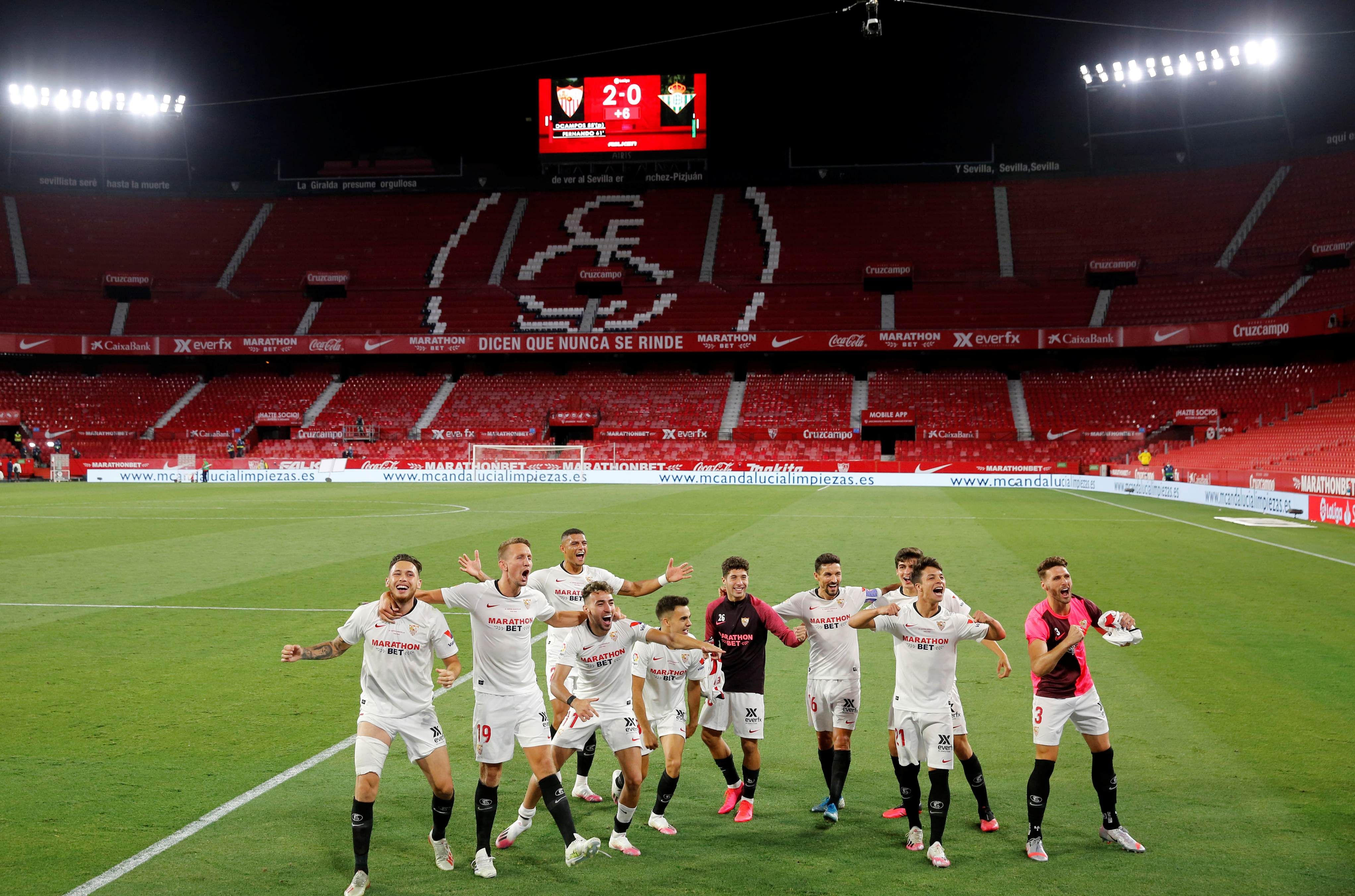 Sevilla players celebrate after the match. Credit: Reuters
