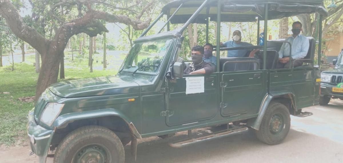 A safari vehicle with social distancing rule gets ready to take tourists into the forest at Kabini in Nagarahole National Park.