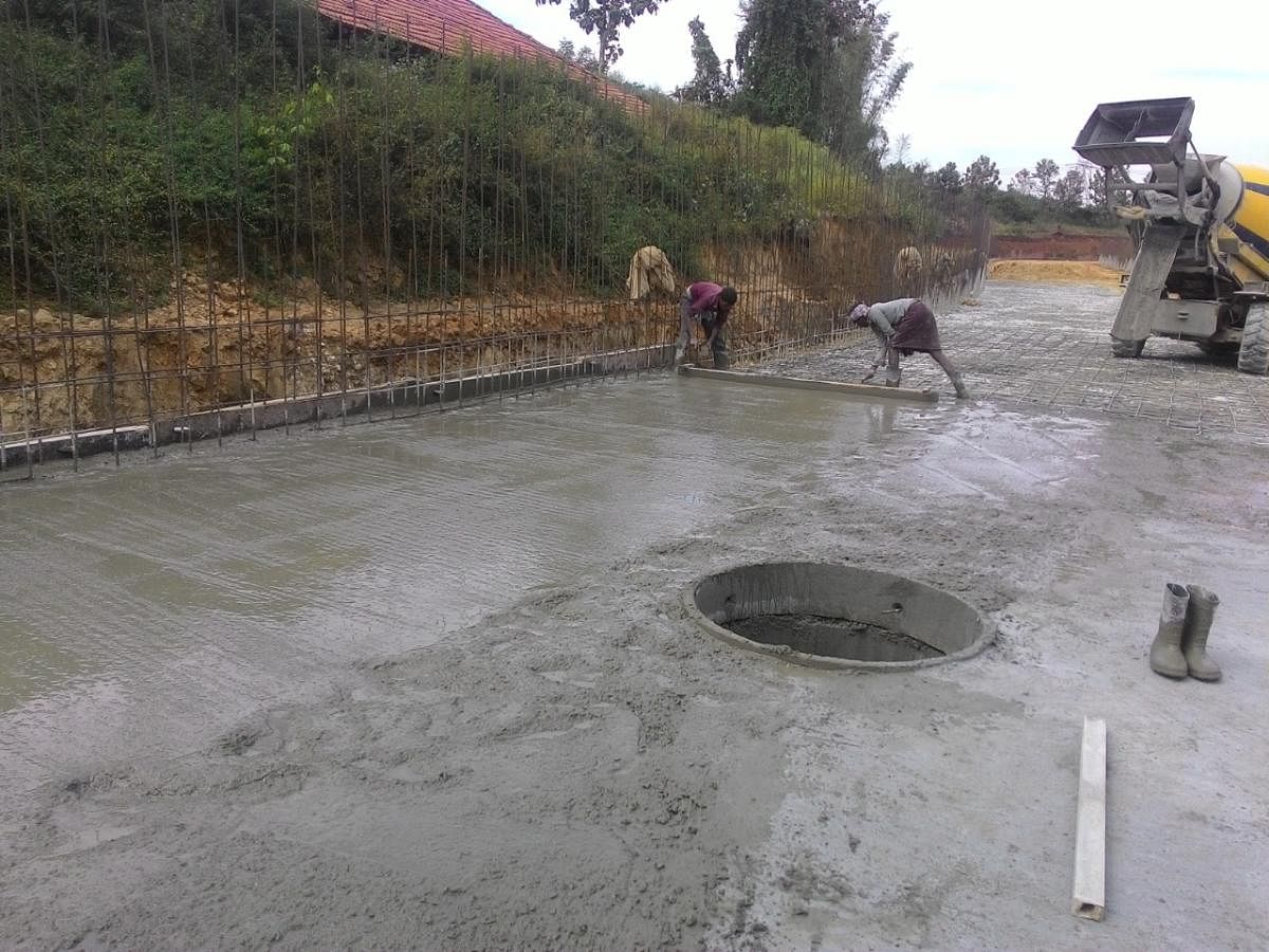 Percolation pits being constructed on a stormwater drain at the Nadaprabhu Kempegowda Layout. Special arrangement