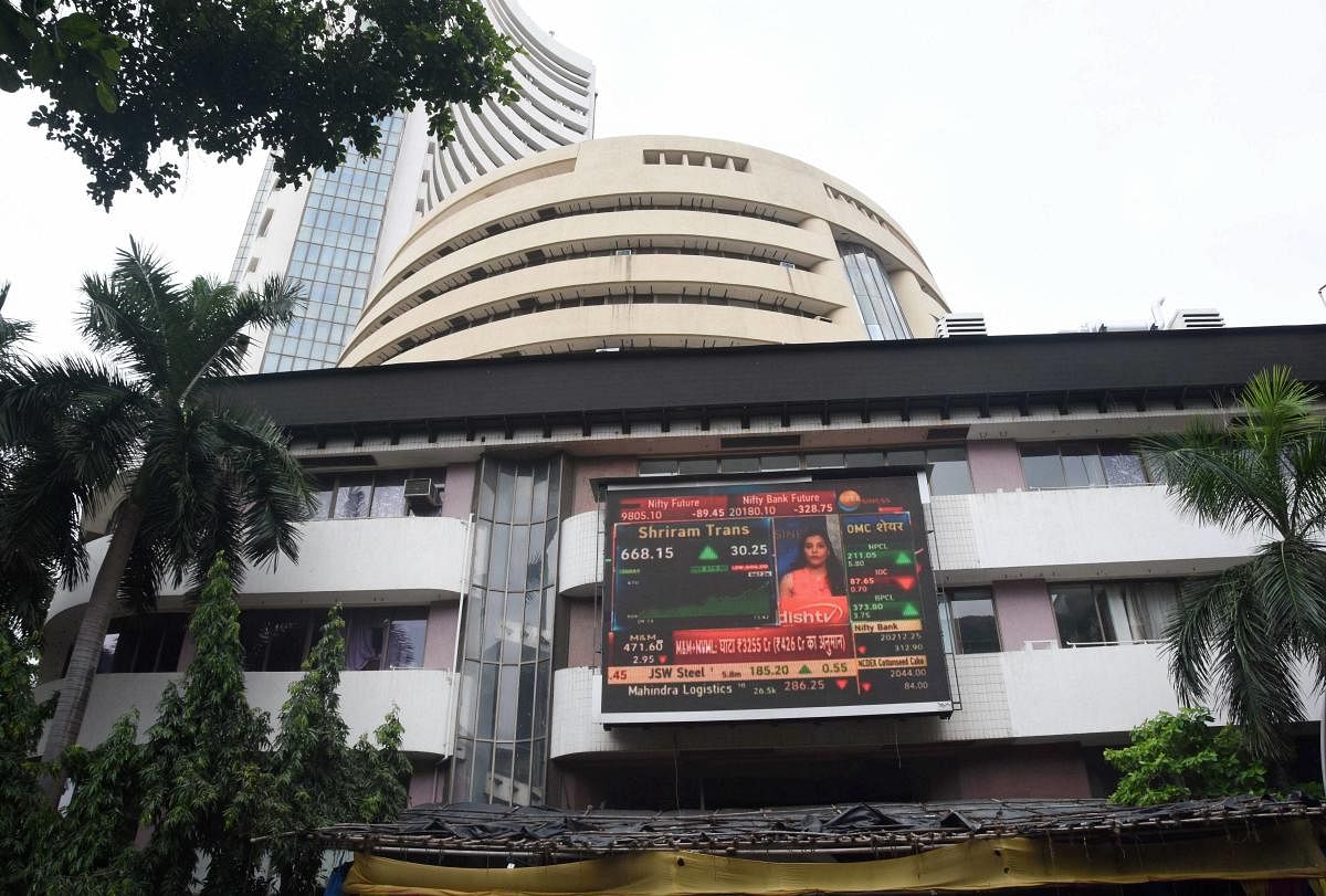 Stock prices displayed on a digital screen at the facade of the Bombay Stock Exchange (BSE) building, in Mumbai, Friday, June 12, 2020. PTI Photo
