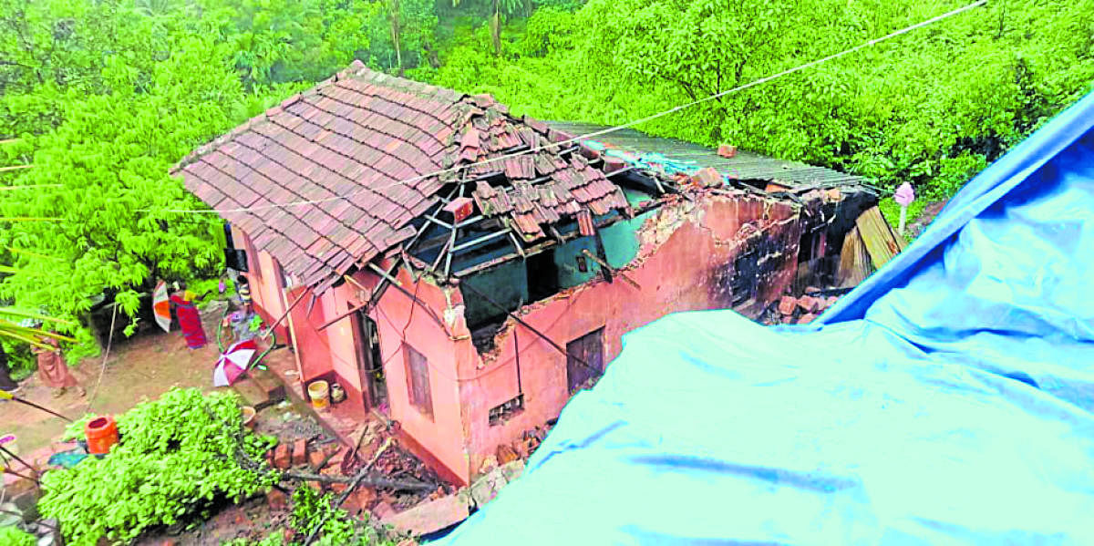A house was damaged after a retaining wall collapsed on it in Pattori near Konaje on Sunday.