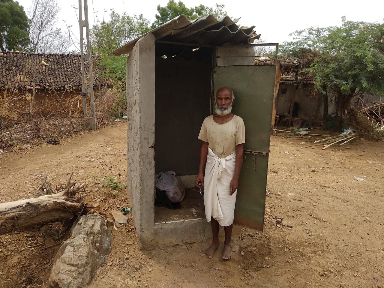 Hagrabhai Taraal has kept remains of his son in a bundle locked in the unused toilet in a village in Banaskantha in north Gujarat. Credit: DH Photo