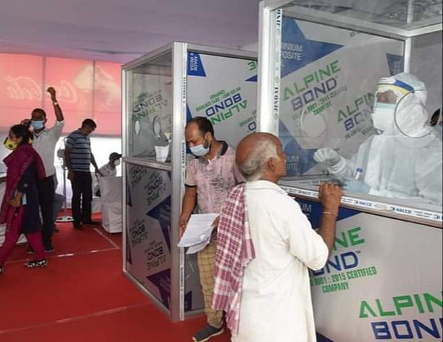 Swab sample being collected in Guwahati for Coronavirus test on Wednesday. (DH photo) 